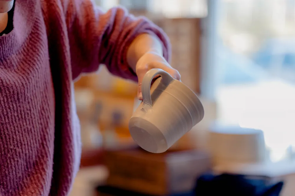 Das Henkeln einer Tasse