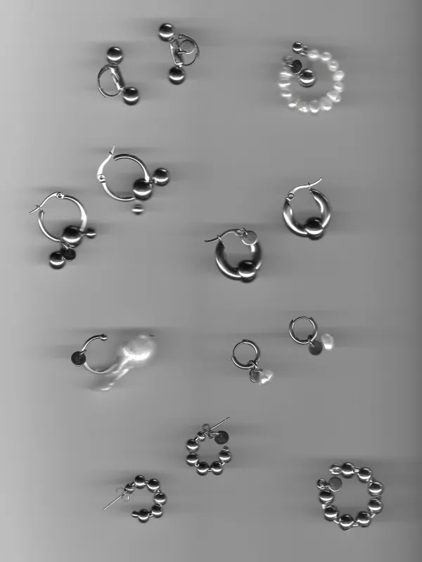 Auswahl von Ohrringen aus Edelstahl und Süßwasserperlen von ALTER ALTER.