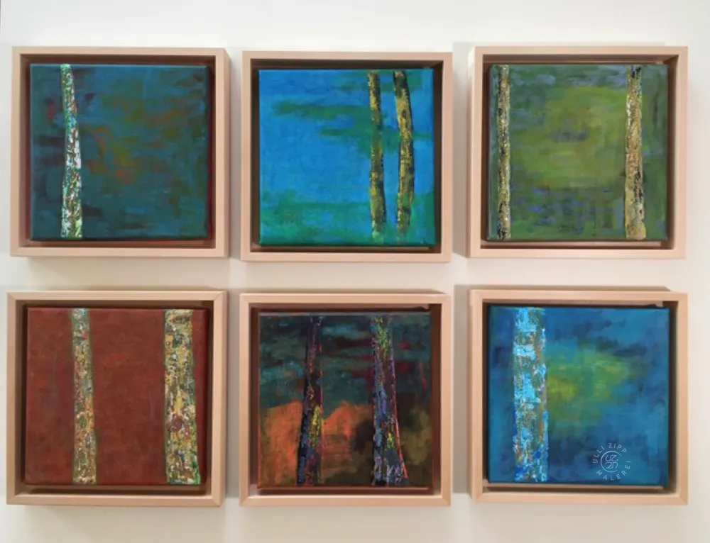 6 kleine Bilder als Block angeordnet. Jedes Bild zeigt eine Landschaft mit ruhigem Hintergrund und 1 bis 2 Baumstämmen im Vordergrund, jedes Bild ist mit einer Schaffenfuge in Buchenholz gerahmt.
